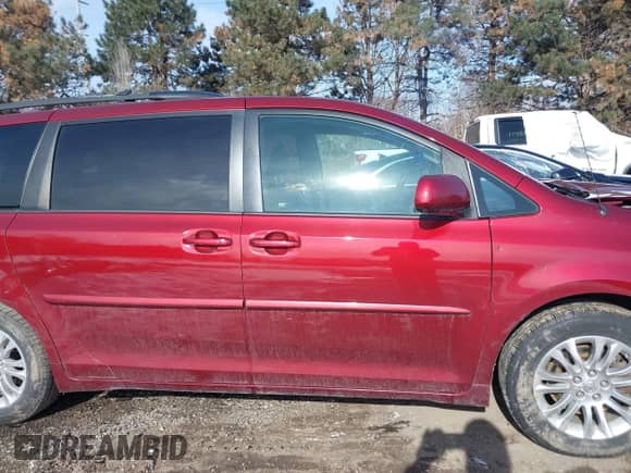 2011 Toyota Sienna XLE AAS with VIN 5TDYK3DC1BS112132, listed as a IAAI auction lot 41376800 with 161,806 mi miles and . Bid and sale history available at DreamBid. Image 14.