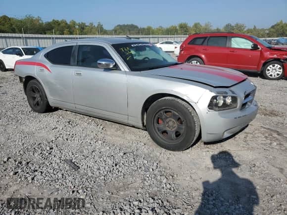 2009 Dodge Charger SXT с VIN 2B3KA33V39H554643, выставлен на аукционе Copart как лот 71962974 с пробегом 186 688 миль миль и Списание • Salvage title. История ставок и продаж доступна на DreamBid. Изображение 4.