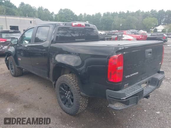 2022 Chevrolet Colorado 4WD Z71 z VIN 1GCGTDEN1N1228852, wystawiony jako IAAI lot #42755134 z przebiegiem 50 539 mil mil oraz . Historia ofert i sprzedaży dostępna na DreamBid. Obrazek 14.