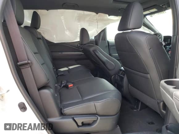 2023 Honda Passport EX-L with VIN 5FNYF8H5XPB018355, listed as a Copart auction lot 66667405 with 26,126 mi miles and Salvage title. Bid and sale history available at DreamBid. Image 11.