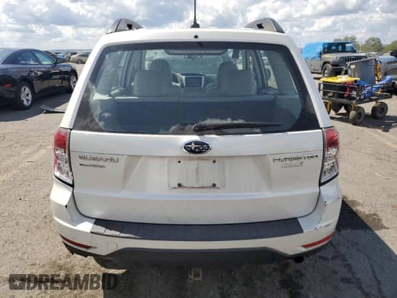 2013 Subaru Forester X z VIN JF2SHABC0DG424937, wystawiony jako Copart lot #70748745 z przebiegiem 149 471 mil mil oraz Szkoda całkowita • Salvage title. Historia ofert i sprzedaży dostępna na DreamBid. Obrazek 6.