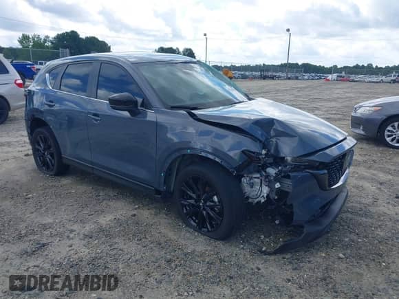 2023 Mazda CX-5 S Carbon Edition z VIN JM3KFBCM3P0262534, wystawiony jako IAAI lot #42740448 z przebiegiem 10 257 mil mil oraz . Historia ofert i sprzedaży dostępna na DreamBid. Obrazek 1.