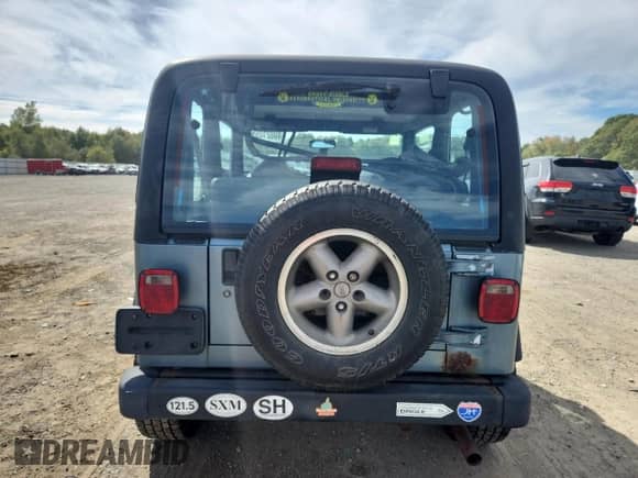 1998 Jeep Wrangler Sport z VIN 1J4FY19S2WP761054, wystawiony jako Copart lot #80021055 z przebiegiem 310 862 mil mil oraz Czysty tytuł • Clean title. Historia ofert i sprzedaży dostępna na DreamBid. Obrazek 6.