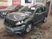 2014 Volkswagen Tiguan S с VIN WVGBV3AX6EW545157, выставлен на аукционе IAAI как лот 42256191 с пробегом 98 361 миль миль и . История ставок и продаж доступна на DreamBid. Изображение 2.