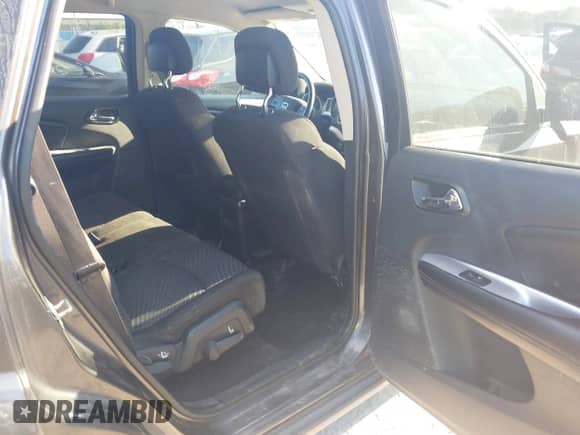 2014 Dodge Journey SE with VIN 3C4PDDAG5ET279249, listed as a IAAI auction lot 43113809 with 205,829 mi miles and . Bid and sale history available at DreamBid. Image 8.