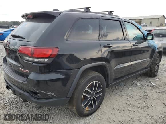 2020 Jeep Grand Cherokee Trailhawk with VIN 1C4RJFLT2LC296476, listed as a Copart auction lot 62125625 with 75,642 mi miles and Salvage title. Bid and sale history available at DreamBid. Image 3.
