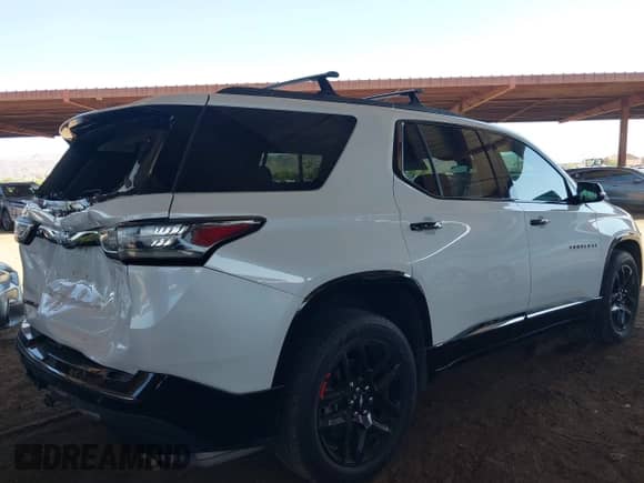 2020 Chevrolet Traverse Premier z VIN 1GNERKKW3LJ117912, wystawiony jako IAAI lot #42317330 z przebiegiem 113 576 mil mil oraz . Historia ofert i sprzedaży dostępna na DreamBid. Obrazek 4.