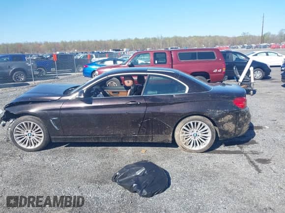 2014 BMW 4 Series 428i with VIN WBA3V7C59EJ872576, listed as a IAAI auction lot 41997699 with Not provided miles and . Bid and sale history available at DreamBid. Image 15.