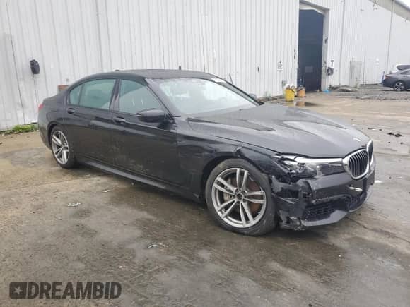2019 BMW 7 Series 740i xDrive with VIN WBA7E4C52KGV28841, listed as a Copart auction lot 56567375 with 162,220 mi miles and Salvage title. Bid and sale history available at DreamBid. Image 4.