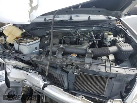 2014 Nissan Frontier S z VIN 1N6BD0CT9EN764214, wystawiony jako Copart lot #57802585 z przebiegiem 87 762 mil mil oraz Szkoda całkowita • Salvage title. Historia ofert i sprzedaży dostępna na DreamBid. Obrazek 11.