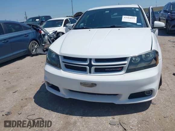 2014 Dodge Avenger R/T with VIN 1C3CDZBG0EN187934, listed as a IAAI auction lot 43184553 with 86,273 mi miles and . Bid and sale history available at DreamBid. Image 6.