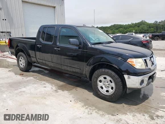 2011 Nissan Frontier SV with VIN 1N6AD0FR0BC400170, listed as a Copart auction lot 57151785 with 235,903 mi miles and Salvage title. Bid and sale history available at DreamBid. Image 4.