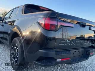 2022 Hyundai Santa Cruz SEL с VIN 5NTJBDAEXNH013883, выставлен на аукционе Copart как лот 73432394 с пробегом 15 329 миль миль и Списание • Salvage title. История ставок и продаж доступна на DreamBid. Изображение 3.