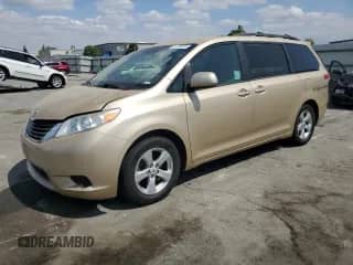 2012 Toyota Sienna LE AAS with VIN 5TDKK3DCXCS219252, listed as a Copart auction lot 80136015 with 142,864 mi miles and Salvage title. Bid and sale history available at DreamBid. Image 1.