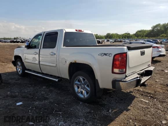 2013 GMC Sierra 1500 SLT с VIN 3GTP2WE7XDG210317, выставлен на аукционе Copart как лот 70132025 с пробегом 128 727 миль миль и Списание • Salvage title. История ставок и продаж доступна на DreamBid. Изображение 2.