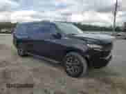 2021 Chevrolet Suburban Z71 z VIN 1GNSKDKD8MR213247, wystawiony jako Copart lot #85753325 z przebiegiem 77 937 mil mil oraz Szkoda całkowita • Salvage title. Historia ofert i sprzedaży dostępna na DreamBid. Obrazek 4.