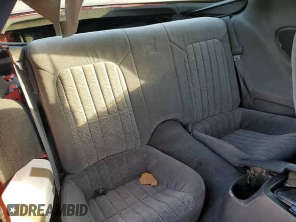 1997 Chevrolet Camaro RS z VIN 2G1FP22K2V2105251, wystawiony jako Copart lot #75874114 z przebiegiem 113 820 mil mil oraz Czysty tytuł • Clean title. Historia ofert i sprzedaży dostępna na DreamBid. Obrazek 10.