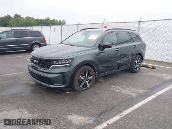 2022 Kia Sorento S with VIN 5XYRL4LC6NG161787, listed as a IAAI auction lot 43299043 with 64,817 mi miles and . Bid and sale history available at DreamBid. Image 2.