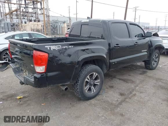 2017 Toyota Tacoma SR5 with VIN 3TMAZ5CN3HM026387, listed as a IAAI auction lot 42362780 with 216,739 mi miles and . Bid and sale history available at DreamBid. Image 4.