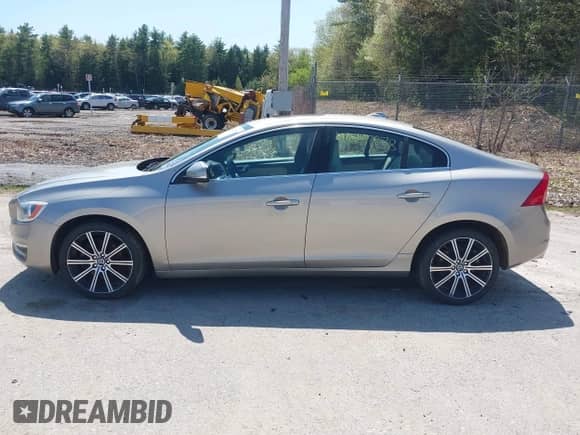 2015 Volvo S60 T5 Drive-E Premier with VIN YV126MFB8F2302747, listed as a IAAI auction lot 42247878 with 95,591 mi miles and . Bid and sale history available at DreamBid. Image 12.