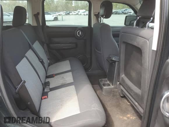 2010 Dodge Nitro SE with VIN 1D4PT2GK5AW124730, listed as a Copart auction lot 49146165 with 142,706 mi miles and Salvage title. Bid and sale history available at DreamBid. Image 11.