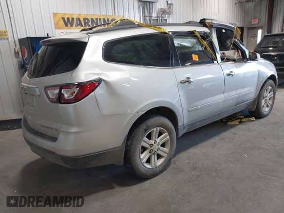 2014 Chevrolet Traverse LT с VIN 1GNKRGKD2EJ107230, выставлен на аукционе IAAI как лот 43039111 с пробегом Не указан миль и . История ставок и продаж доступна на DreamBid. Изображение 4.