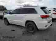 2018 Jeep Grand Cherokee High Altitude with VIN 1C4RJFCT1JC452696, listed as a Copart auction lot 62885035 with 112,998 mi miles and Salvage title. Bid and sale history available at DreamBid. Image 2.