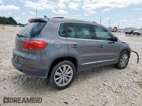2014 Volkswagen Tiguan SEL z VIN WVGAV3AX7EW506170, wystawiony jako Copart lot #58852355 z przebiegiem 55 961 mil mil oraz Szkoda całkowita • Salvage title. Historia ofert i sprzedaży dostępna na DreamBid. Obrazek 3.