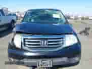 2013 Honda Pilot EX-L with VIN 5FNYF4H52DB011386, listed as a IAAI auction lot 43061878 with 195,846 mi miles and . Bid and sale history available at DreamBid. Image 12.