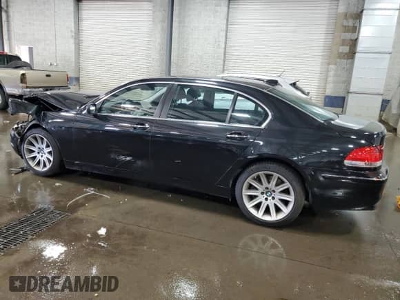 2006 BMW 7 Series 750Li with VIN WBAHN83506DT64606, listed as a Copart auction lot 65986945 with 43,116 mi miles and Salvage title. Bid and sale history available at DreamBid. Image 2.