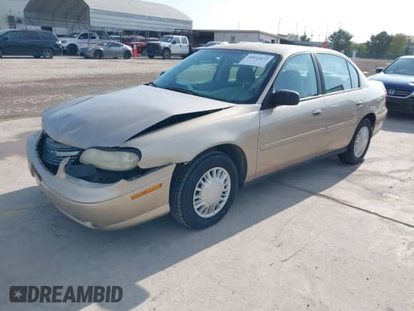 2004 Chevrolet Malibu Classic z VIN 1G1ND52F04M637230, wystawiony jako IAAI lot #40837935 z przebiegiem 56 072 mil mil oraz . Historia ofert i sprzedaży dostępna na DreamBid. Obrazek 2.