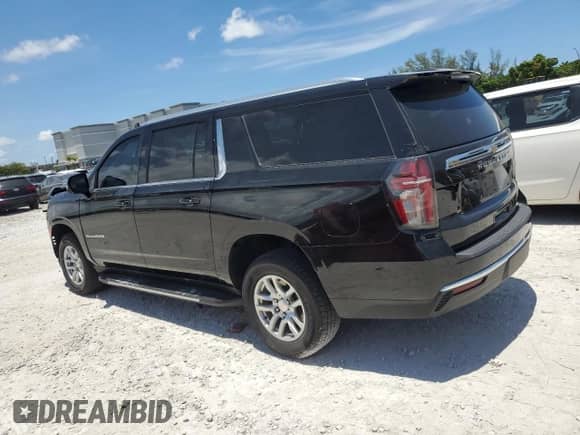 2023 Chevrolet Suburban LT с VIN 1GNSCCKD5PR148949, выставлен на аукционе Copart как лот 61658625 с пробегом 103 447 миль миль и Списание • Salvage title. История ставок и продаж доступна на DreamBid. Изображение 2.
