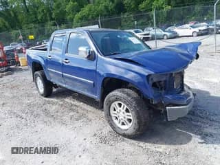 2011 Chevrolet Colorado 1LT z VIN 1GCHTCFE5B8124302, wystawiony jako IAAI lot #42494908 z przebiegiem 121 194 mil mil oraz . Historia ofert i sprzedaży dostępna na DreamBid. Obrazek 1.