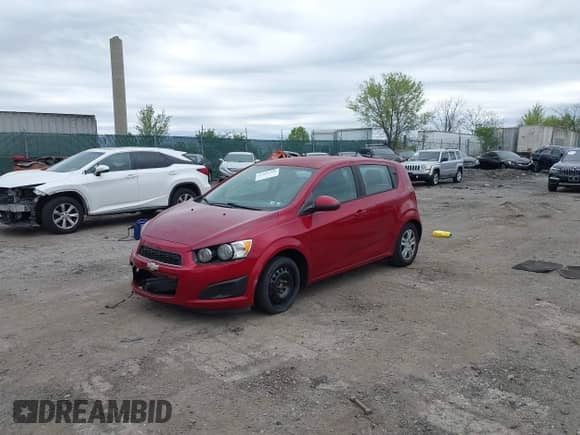 2012 Chevrolet Sonic LS with VIN 1G1JB6SHXC4114498, listed as a IAAI auction lot 42091500 with 128,638 mi miles and . Bid and sale history available at DreamBid. Image 18.