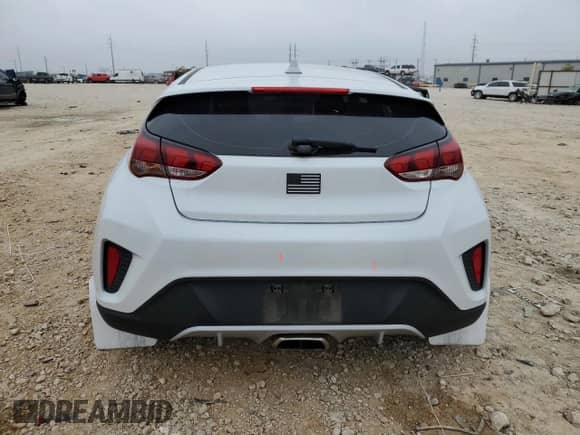 2019 Hyundai Veloster 2.0 z VIN KMHTG6AF5KU018693, wystawiony jako Copart lot #76660363 z przebiegiem 74 498 mil mil oraz . Historia ofert i sprzedaży dostępna na DreamBid. Obrazek 6.