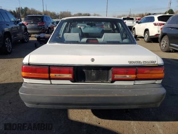1991 Toyota Camry с VIN 4T1SV24E0MU424347, выставлен на аукционе Copart как лот 42566695 с пробегом 162 334 миль миль и Списание • Salvage title. История ставок и продаж доступна на DreamBid. Изображение 6.