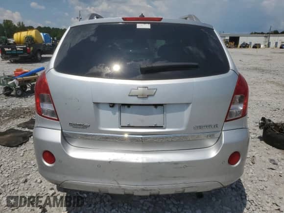 2013 Chevrolet Captiva Sport LTZ с VIN 3GNAL4EK2DS563490, выставлен на аукционе Copart как лот 69373315 с пробегом 122 394 миль миль и Списание • Salvage title. История ставок и продаж доступна на DreamBid. Изображение 6.