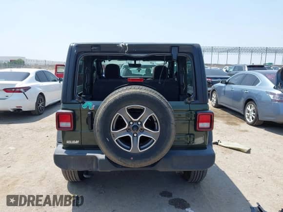 2023 Jeep Wrangler Sport with VIN 1C4HJXAG1PW650435, listed as a IAAI auction lot 42333006 with 16,980 mi miles and . Bid and sale history available at DreamBid. Image 16.