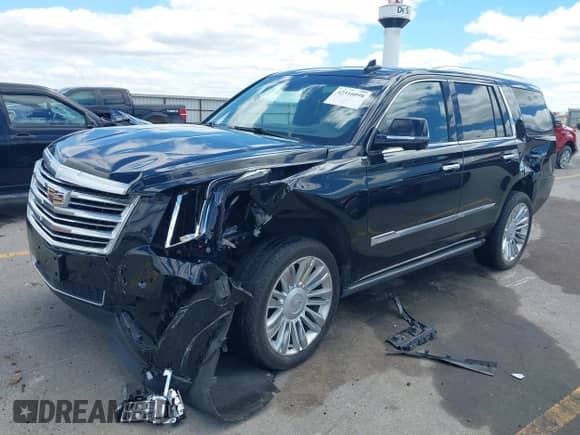2015 Cadillac Escalade Platinum z VIN 1GYS4PKJ8FR568958, wystawiony jako IAAI lot #42316098 z przebiegiem 152 661 mil mil oraz . Historia ofert i sprzedaży dostępna na DreamBid. Obrazek 2.