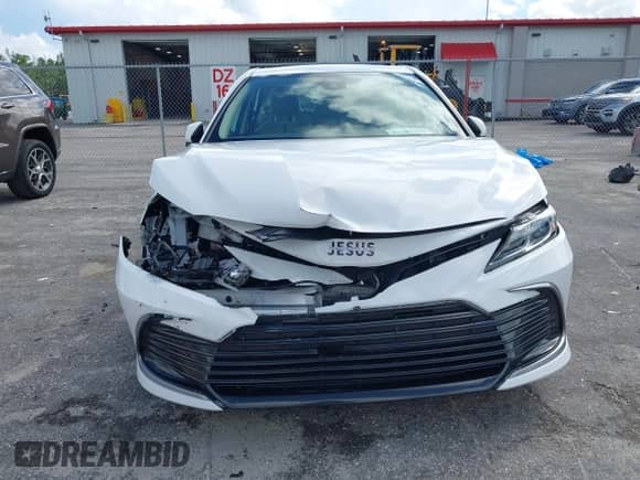 2021 Toyota Camry LE with VIN 4T1C11AK8MU601313, listed as a IAAI auction lot 43383218 with 34,384 mi miles and . Bid and sale history available at DreamBid. Image 12.