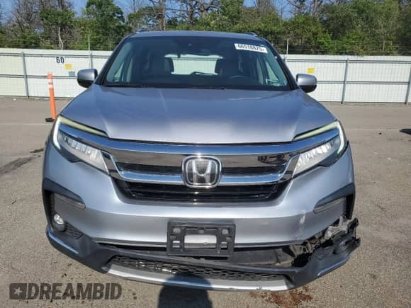 2019 Honda Pilot Touring 8-Passenger z VIN 5FNYF6H90KB008028, wystawiony jako Copart lot #66518825 z przebiegiem 90 735 mil mil oraz Szkoda całkowita • Salvage title. Historia ofert i sprzedaży dostępna na DreamBid. Obrazek 5.