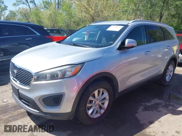 2016 Kia Sorento L with VIN 5XYPG4A3XGG115316, listed as a IAAI auction lot 42024875 with 148,523 mi miles and . Bid and sale history available at DreamBid. Image 2.