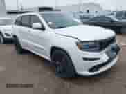 2016 Jeep Grand Cherokee SRT with VIN 1C4RJFDJ0GC456325, listed as a IAAI auction lot 41425211 with 159,746 mi miles and . Bid and sale history available at DreamBid. Image 1.