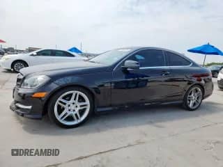 2015 Mercedes-Benz C 250 with VIN WDDGJ4HB6FG350893, listed as a Copart auction lot 70603285 with 114,751 mi miles and Salvage title. Bid and sale history available at DreamBid. Image 1.