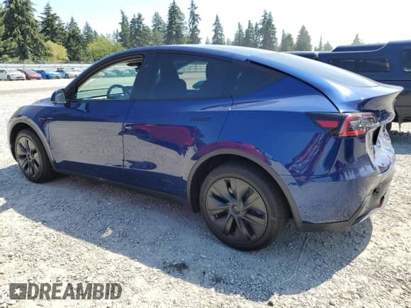 2024 Tesla Model Y Long Range with VIN 7SAYGDEEXRF129763, listed as a Copart auction lot 70710374 with 333 mi miles and Salvage title. Bid and sale history available at DreamBid. Image 2.