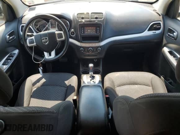 2016 Dodge Journey SXT with VIN 3C4PDDBG7GT216610, listed as a Copart auction lot 69681695 with 97,874 mi miles and Salvage title. Bid and sale history available at DreamBid. Image 8.