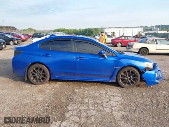 2021 Subaru WRX Premium with VIN JF1VA1C69M9816477, listed as a IAAI auction lot 42616995 with 54,668 mi miles and . Bid and sale history available at DreamBid. Image 12.