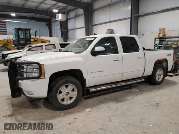 2013 Chevrolet Silverado 1500 LTZ с VIN 3GCPKTE24DG204077, выставлен на аукционе Copart как лот 87686625 с пробегом 214 161 миль миль и Списание • Salvage title. История ставок и продаж доступна на DreamBid. Изображение 1.