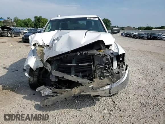 2016 Ram 1500 Tradesman z VIN 1C6RR6FGXGS312515, wystawiony jako Copart lot #66713665 z przebiegiem 94 969 mil mil oraz Szkoda całkowita • Salvage title. Historia ofert i sprzedaży dostępna na DreamBid. Obrazek 14.