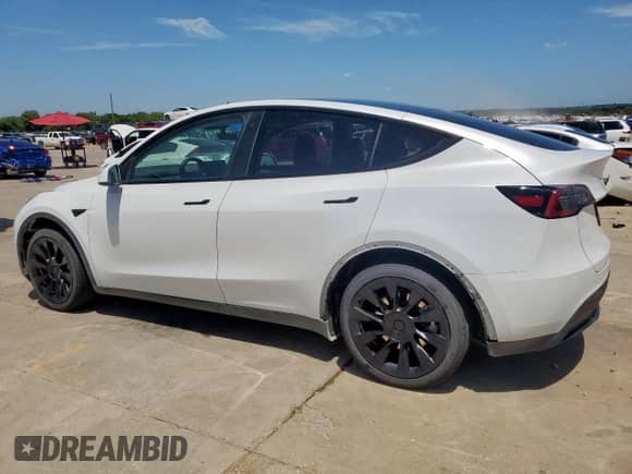 2023 Tesla Model Y Long Range with VIN 7SAYGDEE6PA130256, listed as a Copart auction lot 65733695 with 40,057 mi miles and Clean title. Bid and sale history available at DreamBid. Image 2.
